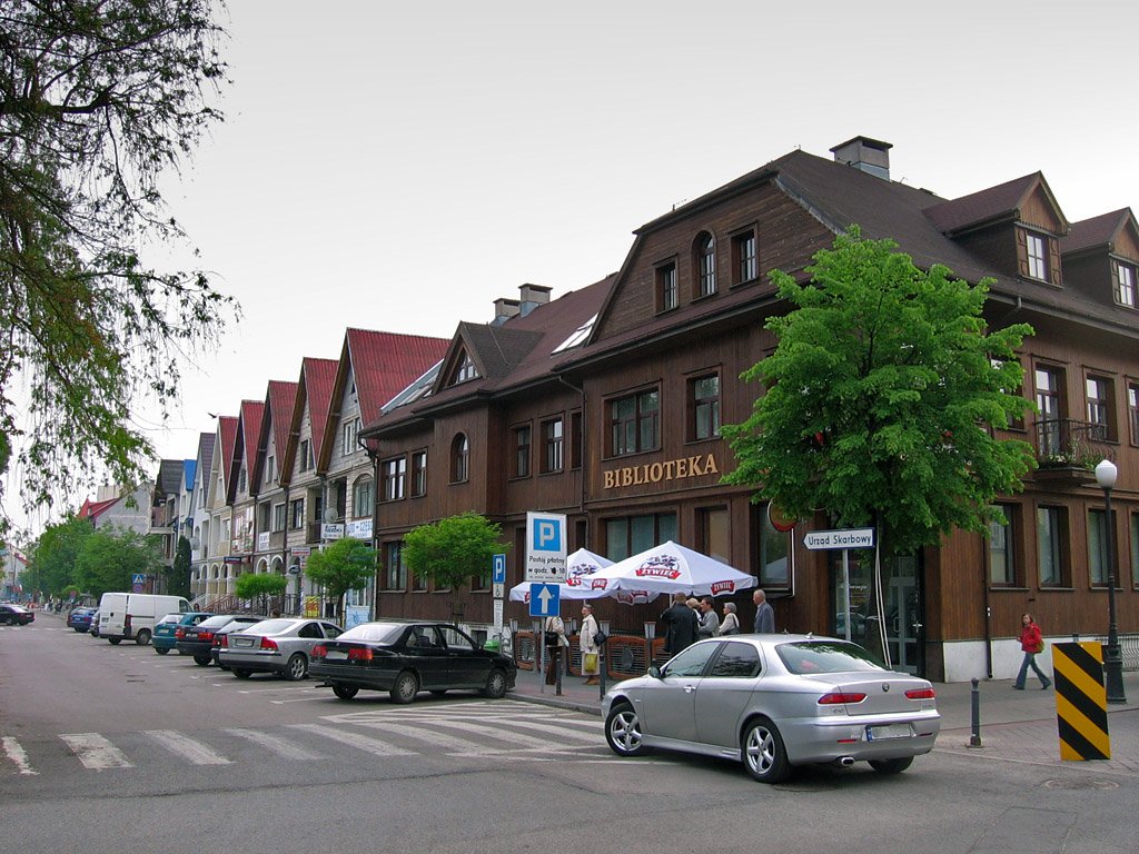 Ostrołęka (Polska), biblioteka publiczna przy ul. Głowackiego 42.

 Ta fotografia przedstawia zabytek wpisany do rejestru zabytków (rejestr Warszawy) województwa mazowieckiego pod numerem A-438 from 02.05.1977.
 | Ostrołęka in Poland