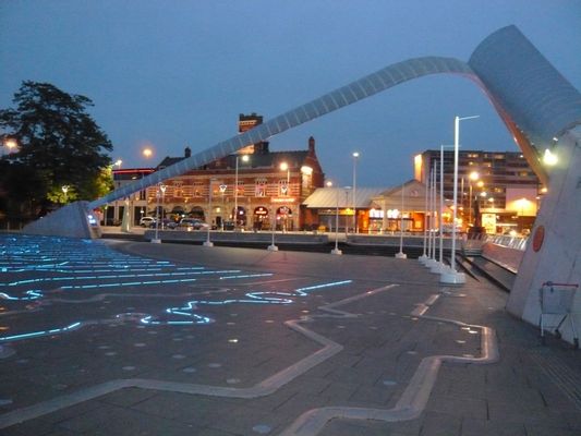 Millennium Square by night, showing the Time Zone Clock designed by Francoise Schein with the Whittle Arch soaring above in Coventry, UK
 | Coventry in United Kingdom