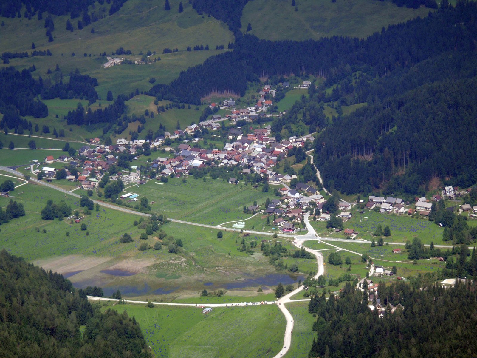 View of Rateče, a settlement in the Upper Sava Valley, from Mt. Ciprnik (Julian Alps). | Rateče in Slovenia