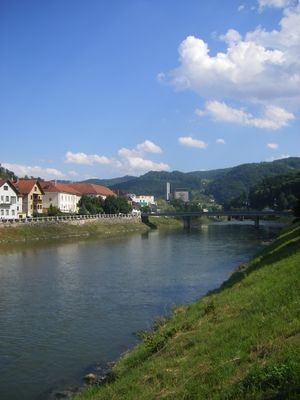 Laško - Savinja River. Far behind is the Laško Brewery (Pivovarna Laško). | Laško in Slovenia