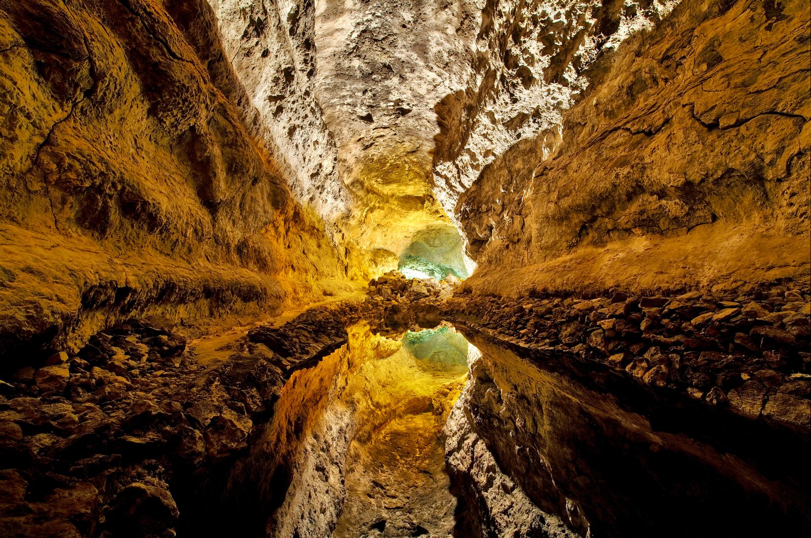 Cueva de los Verdes, Canary Islands, Spain. Cave lake in lava tunnel with optical illusion. | Cueva de los Verdes in Spain