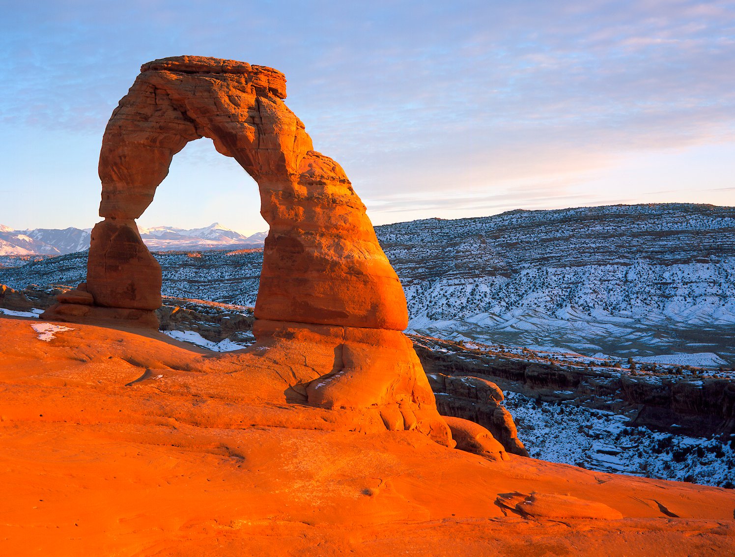 Delicate Arch in Arches National Park, in Utah. | Granite Island Recreation Park in Australia