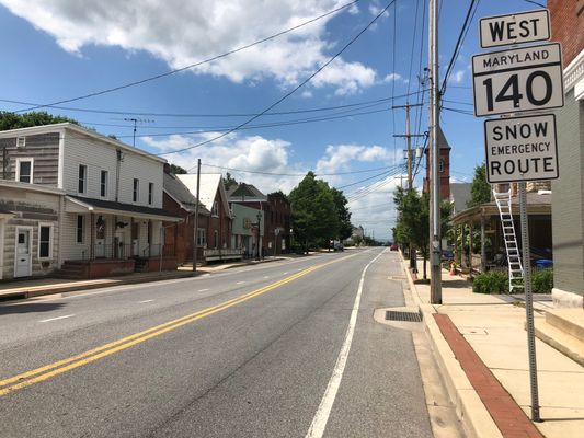 View west along Maryland State Route 140 (Baltimore Street) just west of Maryland State Route 194 (Frederick Street/York Street) in Taneytown, Carroll County, Maryland | Taneytown in United States