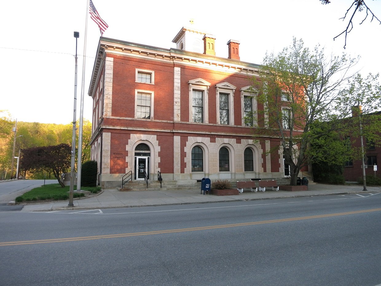 Photo shows the US Post Office at 57 Main St, Windsor, VT 05089. View is toward the southeast from across the street. | Windsor in United States