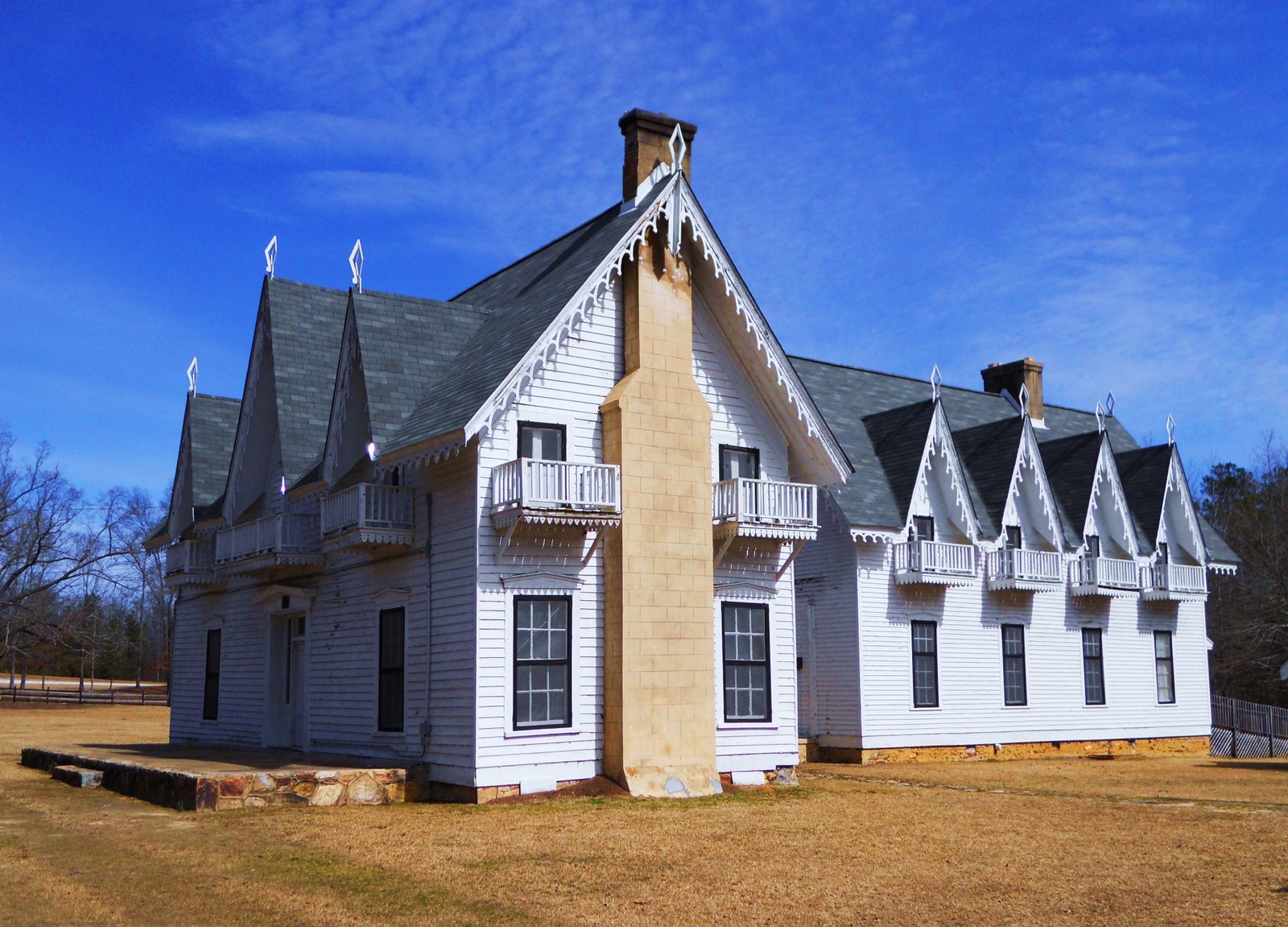 This is a photograph of the Spring Villa house in Spring Villa Park in Opelika, Alabama. It is on the National Register of Historic Places listings in Lee County, Alabama | Opelika in United States