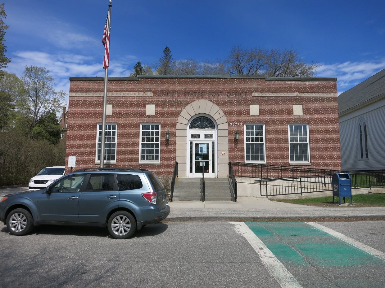 Photo shows the US Post Office at 15 Park St, Newport, NH 03773. View is toward the northeast. | Newport in United States