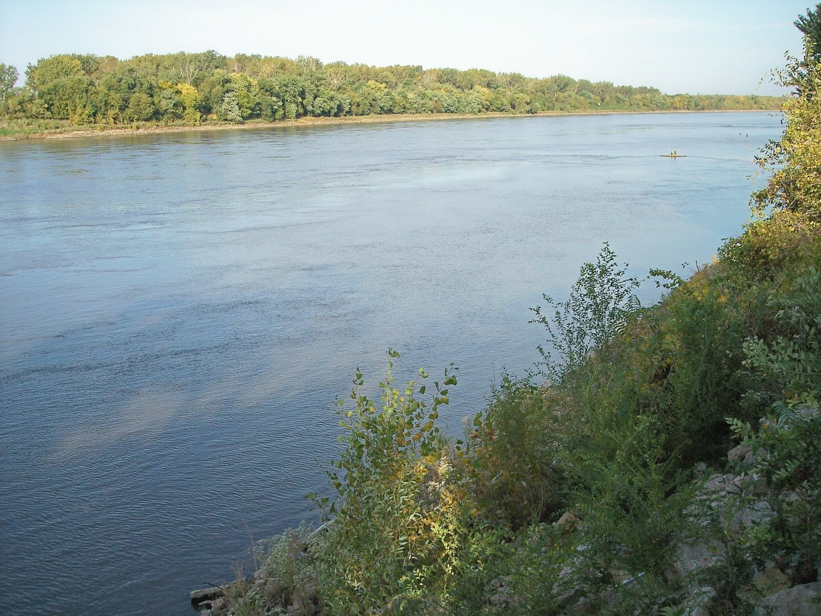 The w:Missouri River in w:Saint Joseph, Missouri as viewed from a footpath near Riverfront Park.  w:Doniphan County, Kansas is on the opposite bank. | Saint Joseph in United States