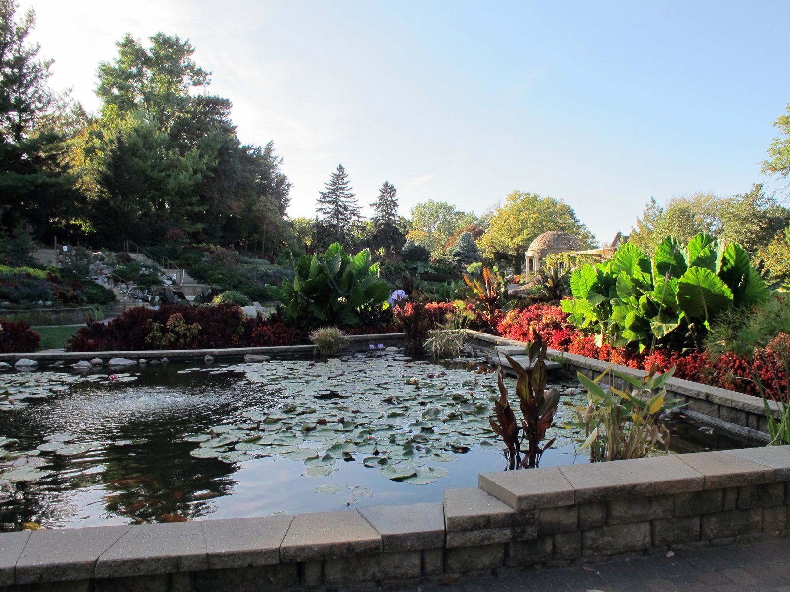 Photo of the Sunken Gardens; taken from within the garden, in Lincoln, Nebraska.  Photo taken from near the southeast pool, looking west-northwest.  The cascades can be seen in the center-left and the Rotary Pavilion in the right-of-center portion of this photo. | Lincoln in United States