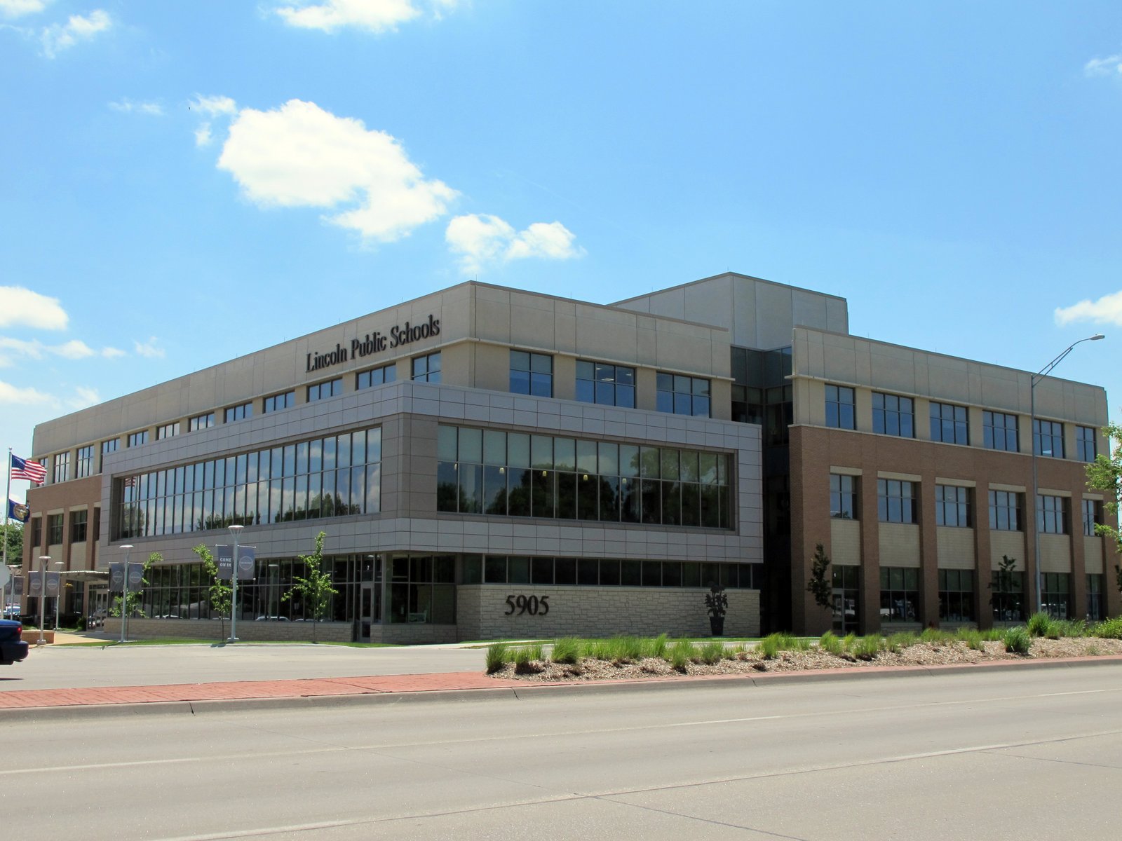 Photo of the new Lincoln Public School District Office, 5905 "O" Street in Lincoln, Nebraska.  Photo is facing south-southwest from the north side of "O" Street, looking towards the north and east (front) sides of the building. | Lincoln in United States