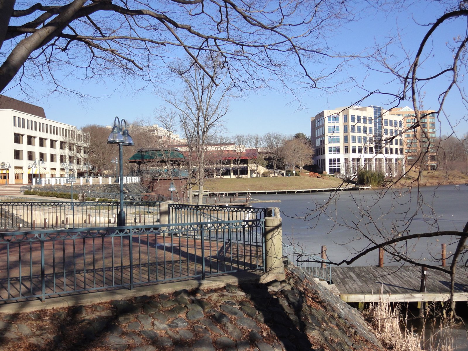 A landscape view of Columbia Town Center in Columbia, Maryland, including Lake Kittamaqundi. Many of the buildings in the area were constructed after 1970. | Frederick in United States